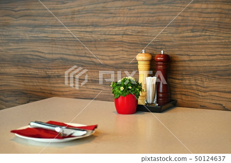 Beautiful wooden table in restaurant or home. Beautiful wooden table in restaurant or home. 50124637