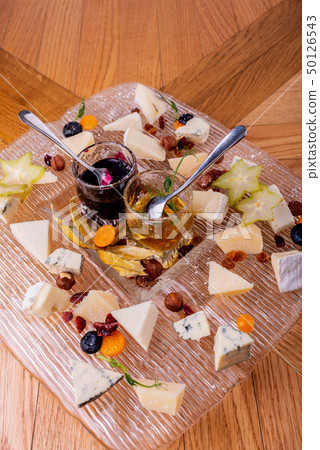 Cheese plate. Top view. Tasty cheese starter. 50126543
