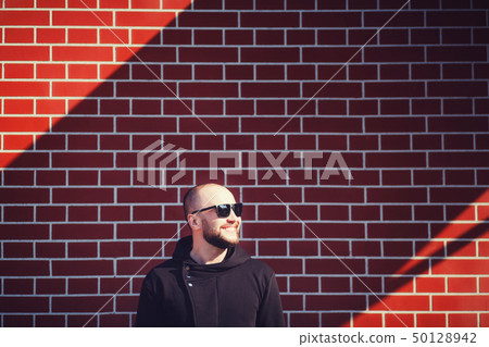 man with beard wearing black blank hoodie man with beard wearing black blank hoodie 50128942