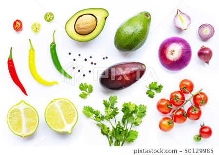 Various fresh vegetables and herbs on white.   50129985