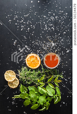 situation with spices and ingredients on dark 50134479