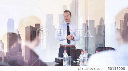 Confident company leader on business meeting against new york city manhattan buildings and Confident company leader on business meeting against new york city manhattan buildings and 50135008