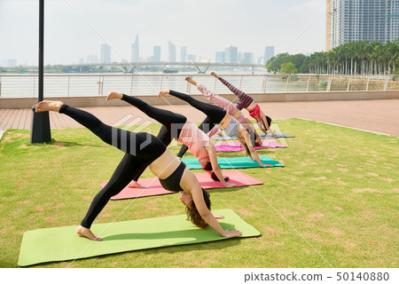 Yoga class outside Yoga class outside 50140880