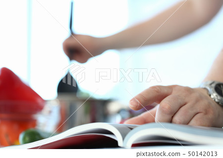 Male Finger Pointing Cookery Book Recipe Photo 50142013