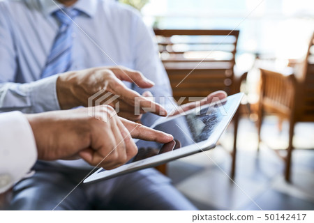 People discusing online presentation People discusing online presentation 50142417