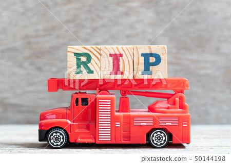 Red fire truck hold letter block in word RIP Red fire truck hold letter block in word RIP 50144198