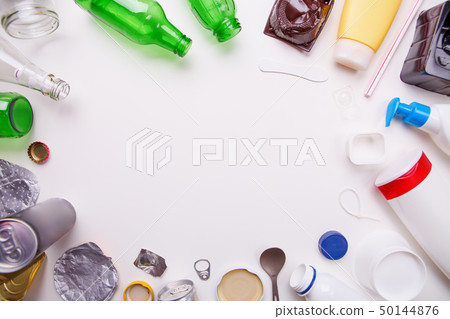 Selection of garbage for recycling - metal, plastic, and glass. Concept of recycling Selection of garbage for recycling - metal, plastic, and glass. Concept of recycling 50144876