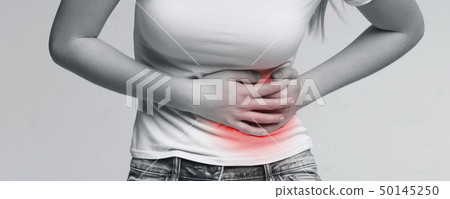 Unhealthy man suffering with stomach pain, feeling unwell Unhealthy man suffering with stomach pain, feeling unwell 50145250