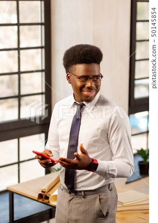 Nice African American young man having success at work 50145854