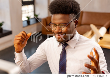 Nice smart young man showing his emotions 50146094