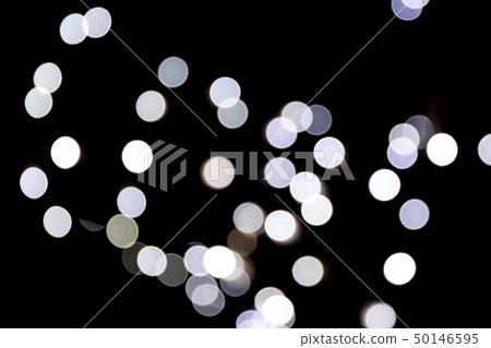 Abstract bokeh of white city lights on black 50146595