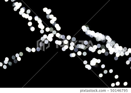 Bokeh white lights on black background, defocused 50146795