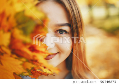 cute girl in a autumn park 50146873