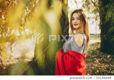 cute girl in a autumn park 50146899