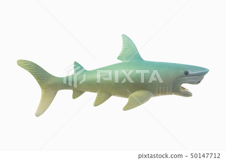 The figure toy white shark isolated closeup image. The figure toy white shark isolated closeup image. 50147712