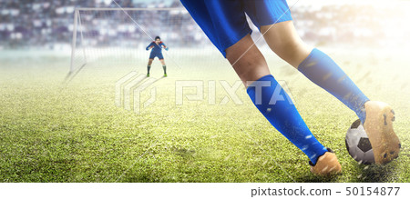 Football player man kicking the ball Football player man kicking the ball 50154877