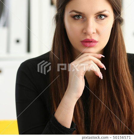 Man and smiling mature woman talking in office 50156571