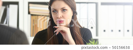 Man and smiling mature woman talking in office Man and smiling mature woman talking in office 50156638
