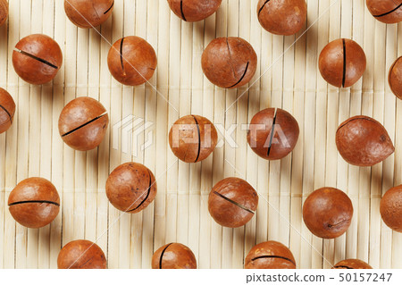 Flat composition with Australian macadamia nuts on Flat composition with Australian macadamia nuts on 50157247