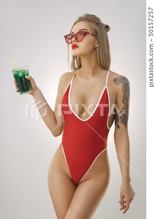 Woman in Bikini With Drink 50157257