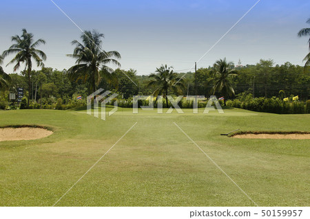 The evening golf course has sunlight in Thailand 50159957