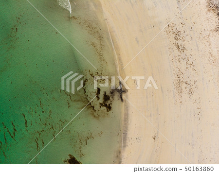 Aerial view. Sea water and sandy shoreline 50163860