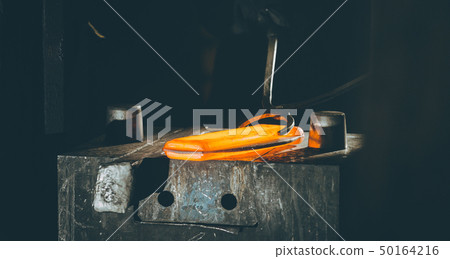 The process of forging metal The process of forging metal 50164216
