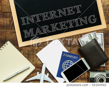 internet marketing handwritten with white chalk 50164482