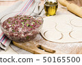fresh raw dough and beef forcemeat 50165500