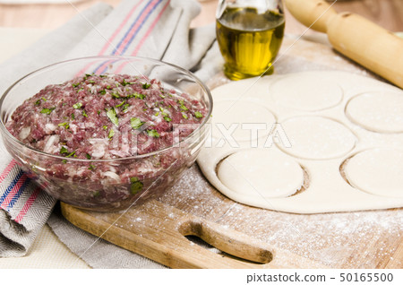 fresh raw dough and beef forcemeat fresh raw dough and beef forcemeat 50165500