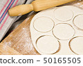 fresh raw dough and rolling pin 50165505