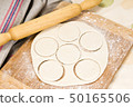 fresh raw dough and rolling pin 50165506