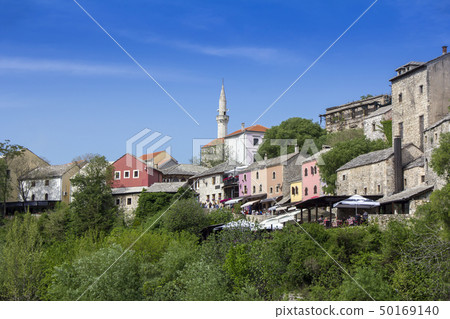 Mostar with the Old Bridge houses and minarets in 50169140