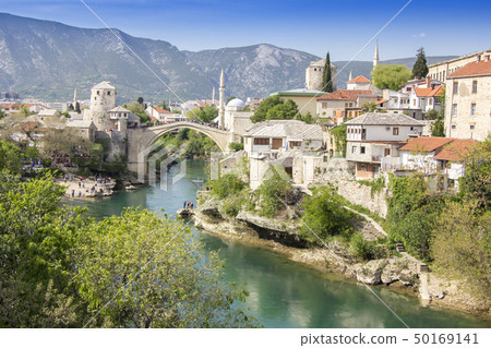 Mostar with the Old Bridge houses and minarets in 50169141