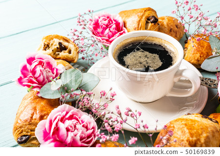 Mini fresh croissants bun and coffee Mini fresh croissants bun and coffee 50169839