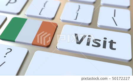 VISIT text and flag of the Republic of Ireland on the buttons on the computer keyboard. Conceptual 50172227