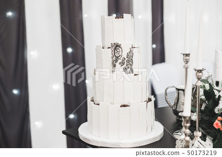 Luxury decorated wedding cake on the table Luxury decorated wedding cake on the table 50173219