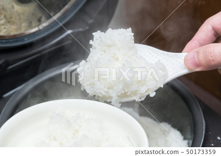 Let's eat rice from rice cooker hand Let's eat rice from rice cooker hand 50173359