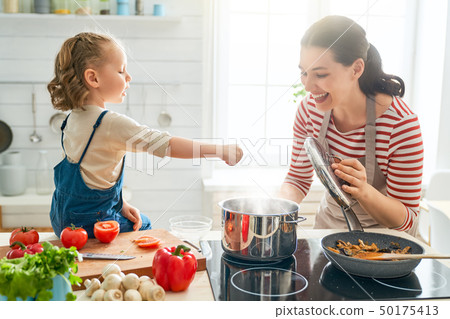 Happy family in the kitchen. Happy family in the kitchen. 50175413