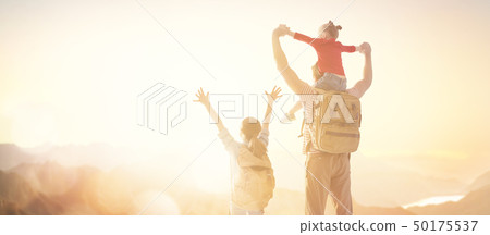 happy family at sunset. 50175537