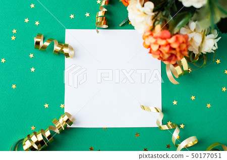 White paper sheet, golden decorations and sparkles White paper sheet, golden decorations and sparkles 50177051