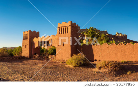 Entry gate of Ait Benhaddou in Morocco at sunset Entry gate of Ait Benhaddou in Morocco at sunset 50177950