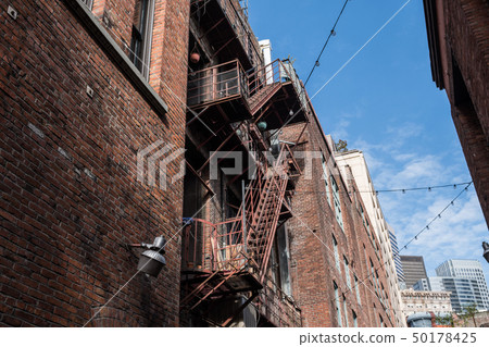 Fire escapes at the rear of an old building in downtown Seattle Fire escapes at the rear of an old building in downtown Seattle 50178425