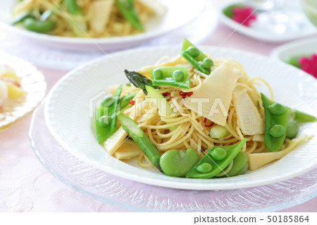 Pasta with spring vegetables 50185864