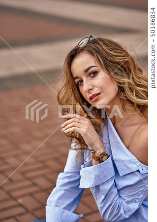 Portrait of a young beautiful woman with brown Portrait of a young beautiful woman with brown 50186834