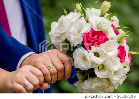 Flowering branch with white delicate flowers on wooden surface. Declaration of love, spring. Wedding 50187199