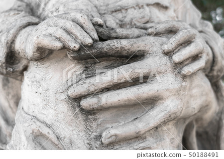 Marble statue with hands of child and woman 50188491