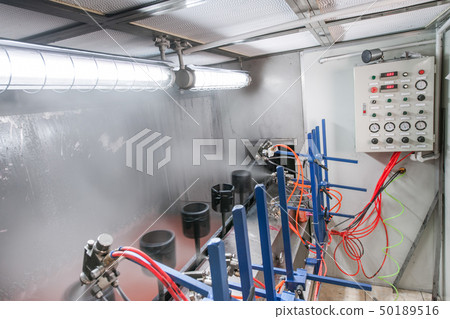 workshop painting parts on the conveyor 50189516