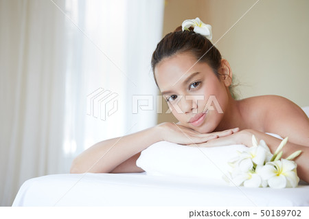 Close up of attractive young Asian woman get spa Close up of attractive young Asian woman get spa 50189702