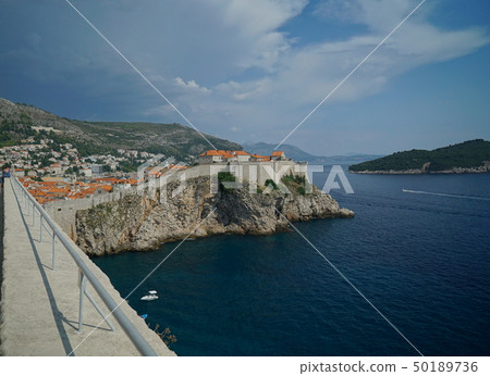 A view of the old town of Dubrovnik, the city called Pearl of the Adriatic Sea, from the Fortress of Lovrjanat A view of the old town of Dubrovnik, the city called Pearl of the Adriatic Sea, from the Fortress of Lovrjanat 50189736